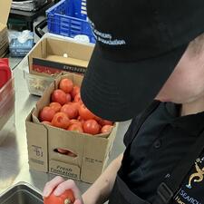 Student with tomatoes